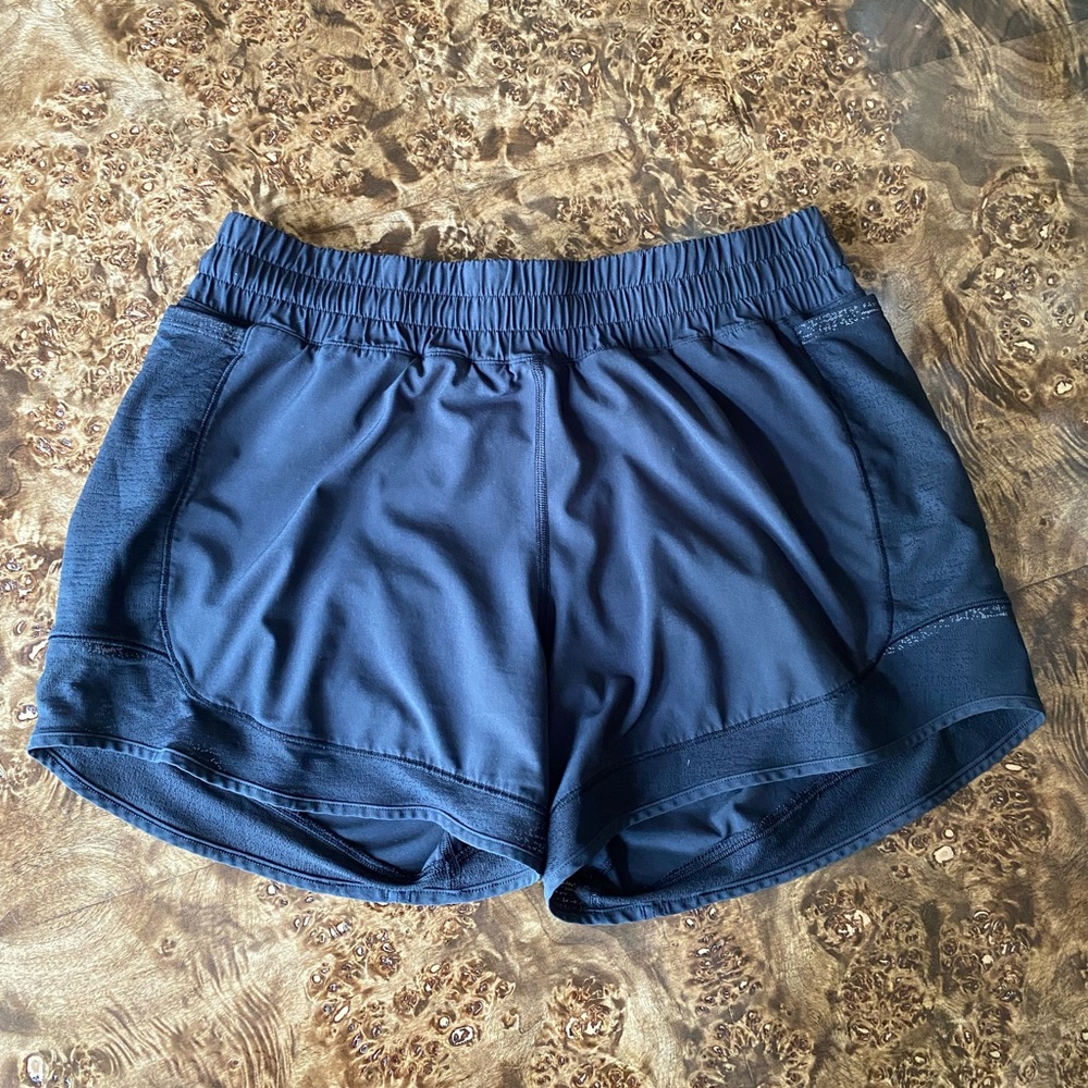 Lululemon hotty hot high rise 4” black shorts. Size 8.